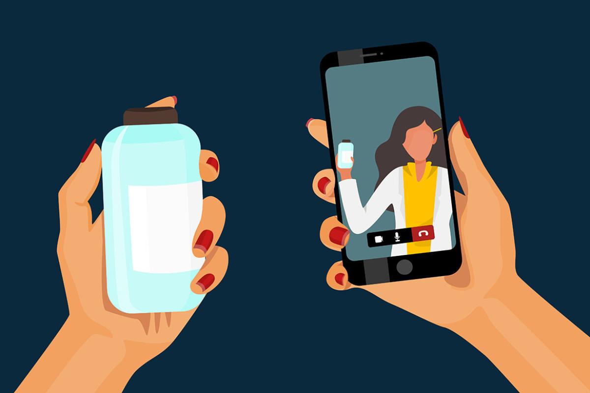 Hands holding a prescription with one hand and a smartphone with another