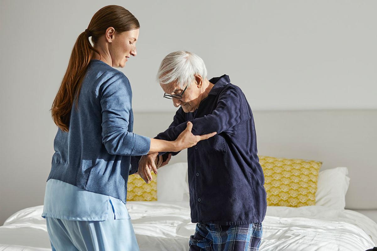 Home health care worker with patient