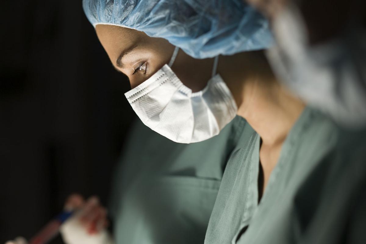 Profile of a health care worker in an operating room