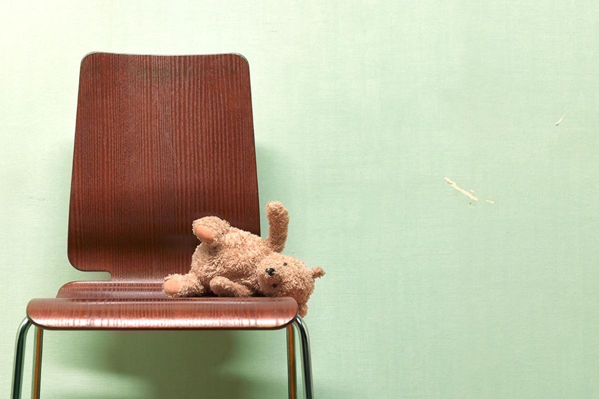  Teddy bear on an empty chair