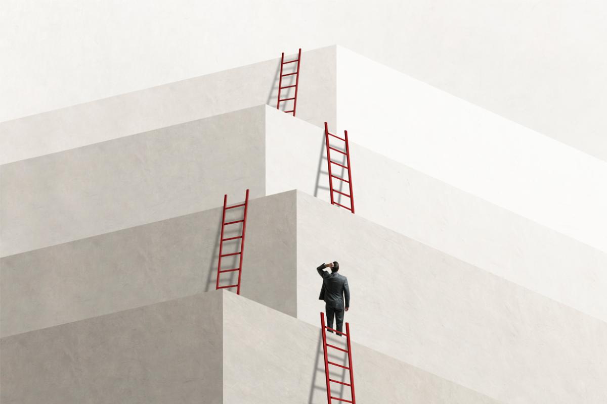  Figure looking up at a series of ladders