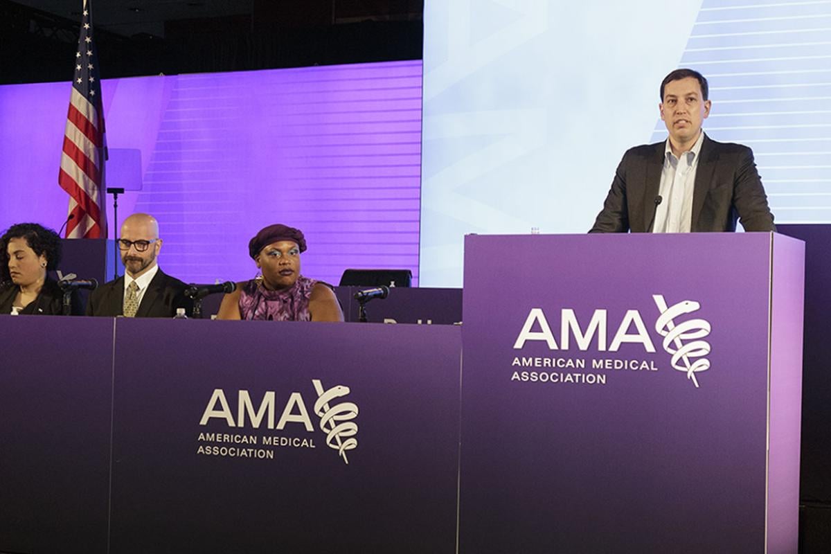 Jesse Ehrenfeld, MD, moderating a panel discussion at the 2023 AMA Annual Meeting