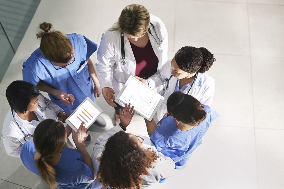 Overhead view of a group of health care workers in discussion
