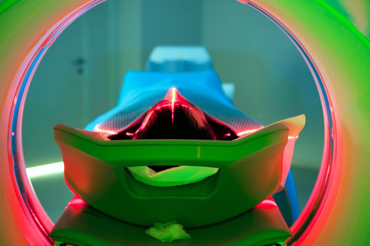 Patient laying on a CT scan platform