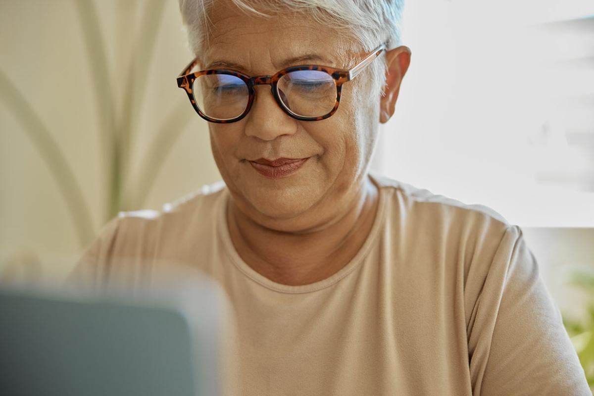 Senior woman browsing the internet