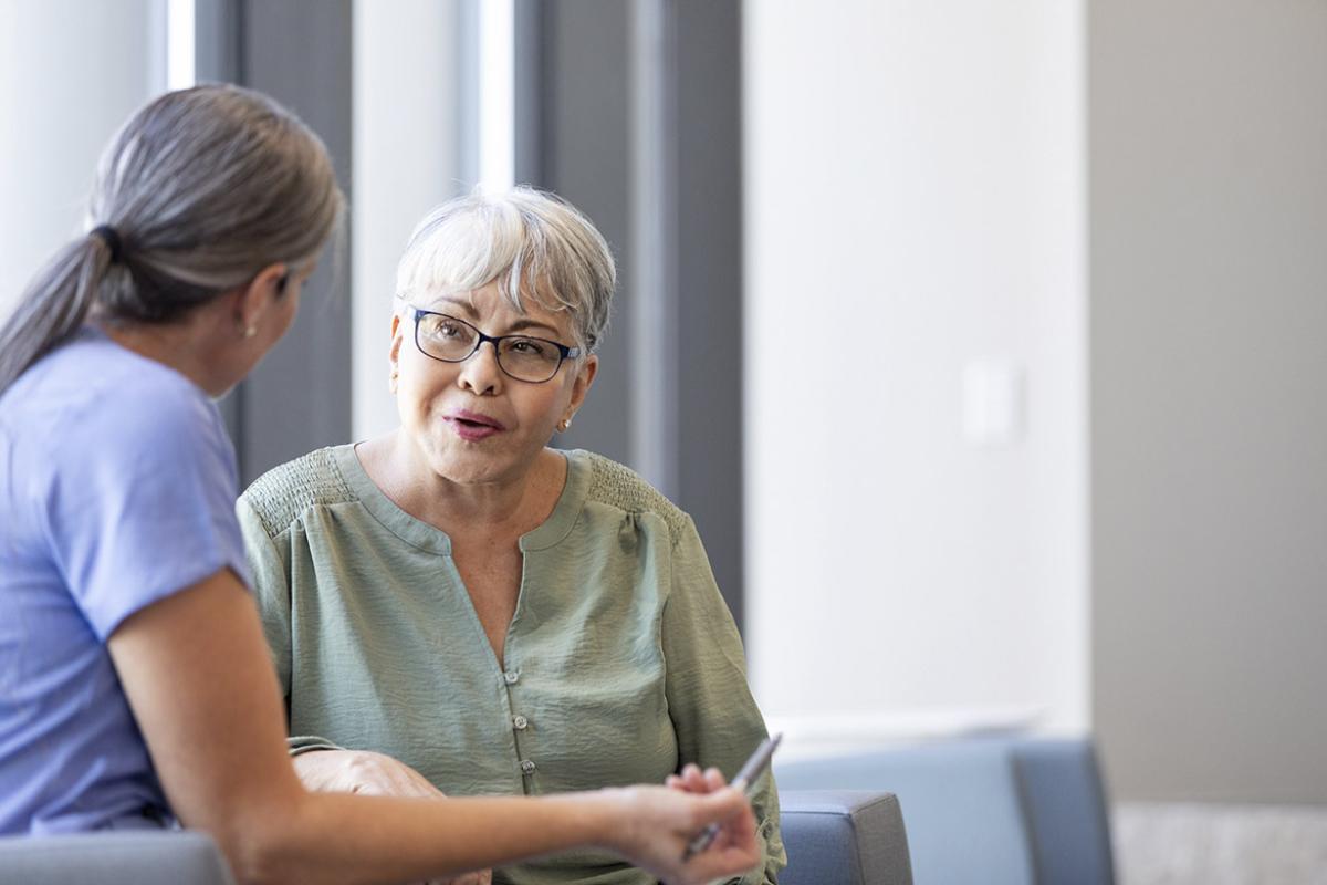 Patient in discussion with physician