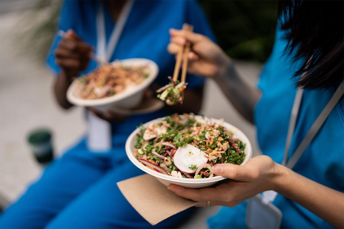 Health care workers eating food