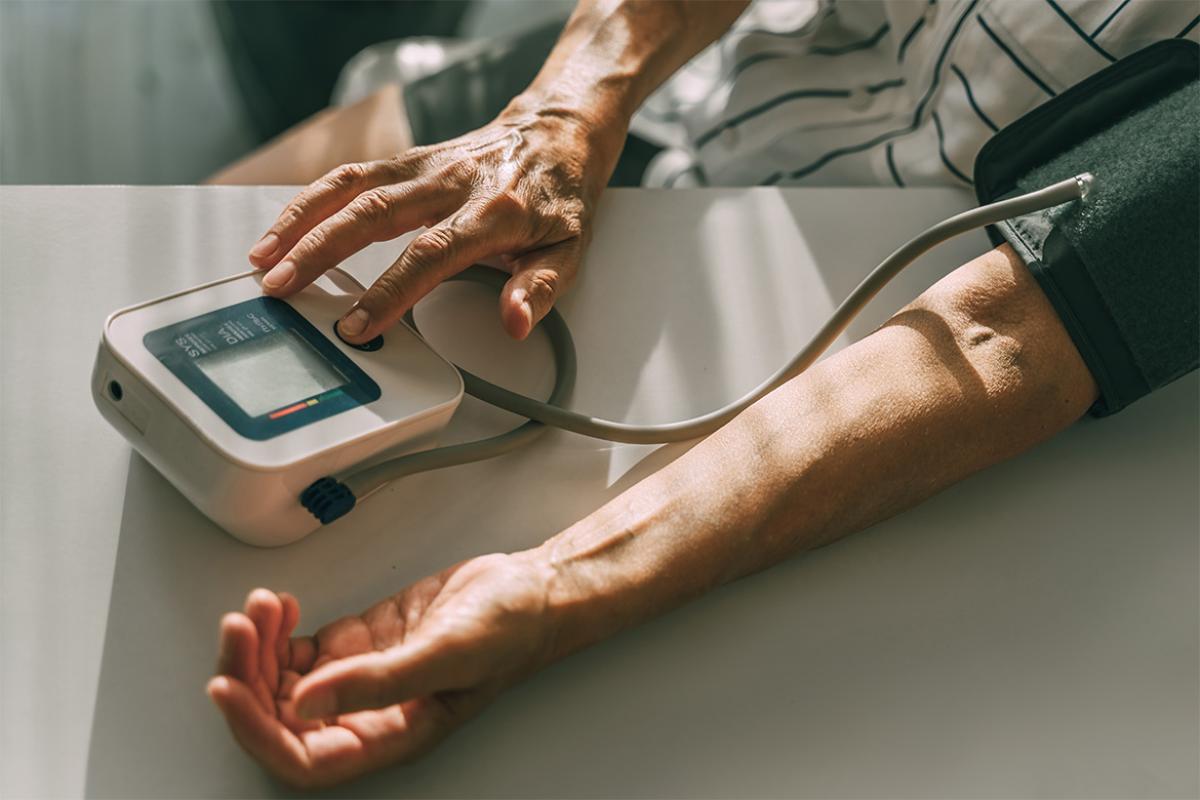 Patient uses blood pressure device