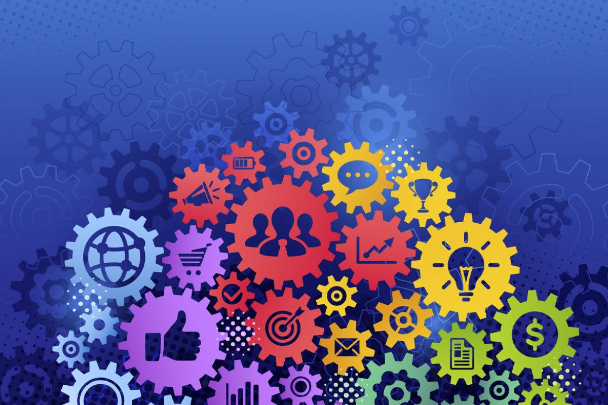 Gears with icons symbolizing business, success, teamwork