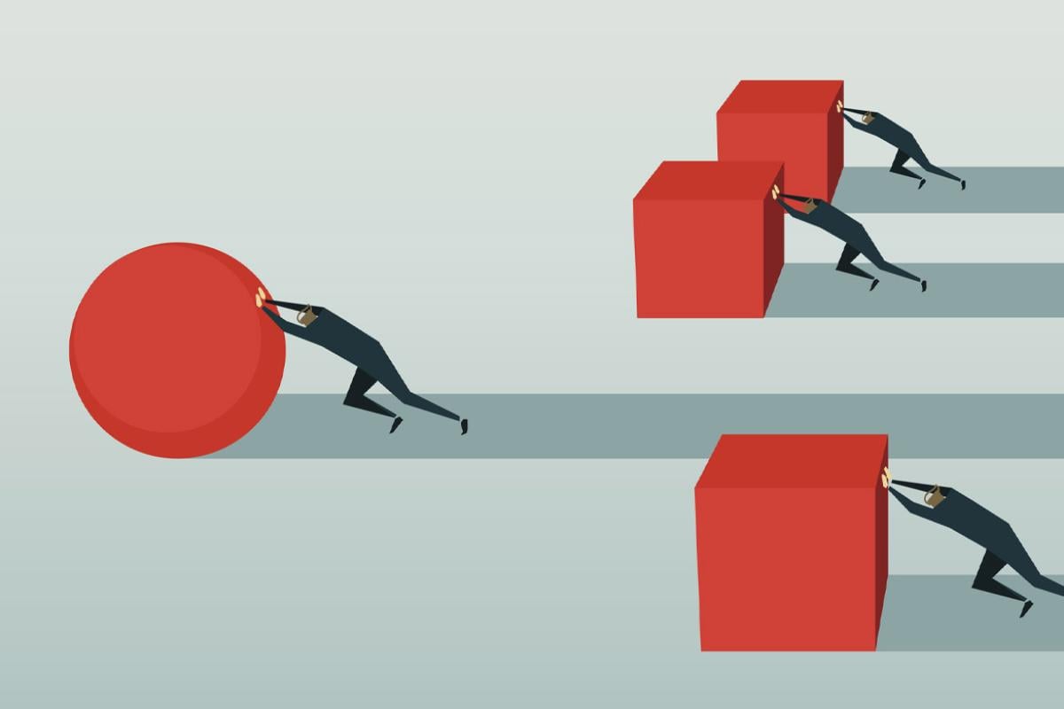 Figures push giant blocks