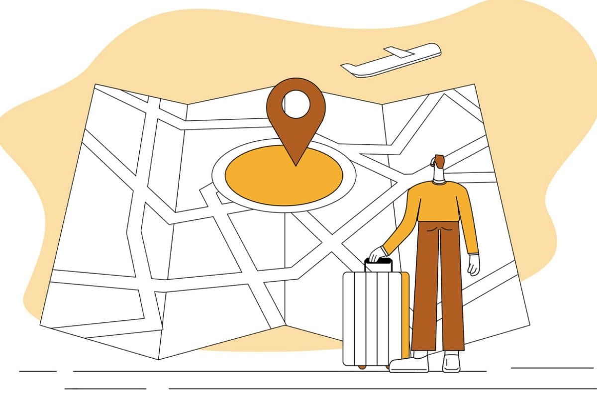 Figure stands by an open map