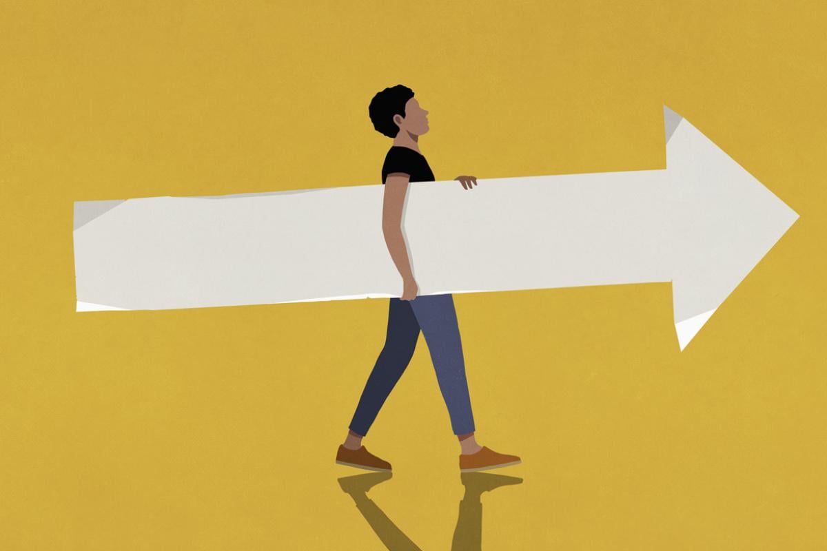 Figure holds a giant arrow