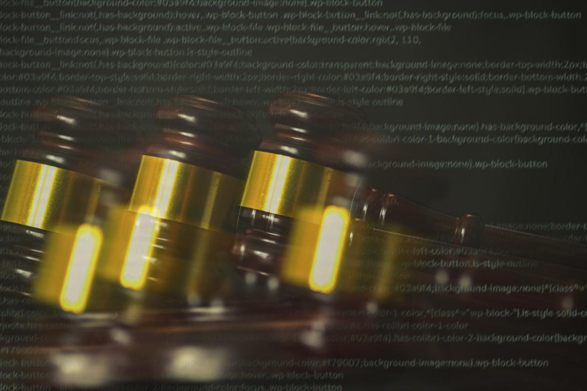 Judge's gavel in movement with a virtual text