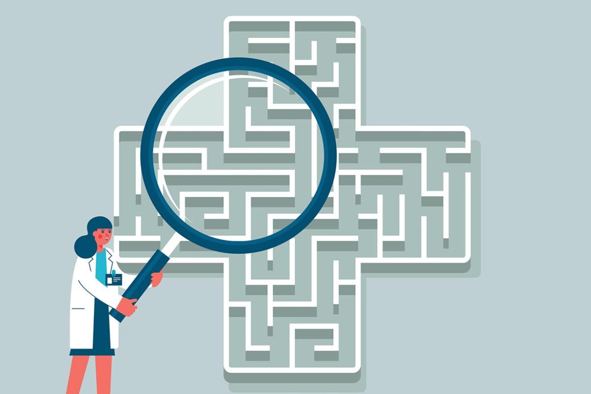 Figure holds giant magnifying glass over a maze