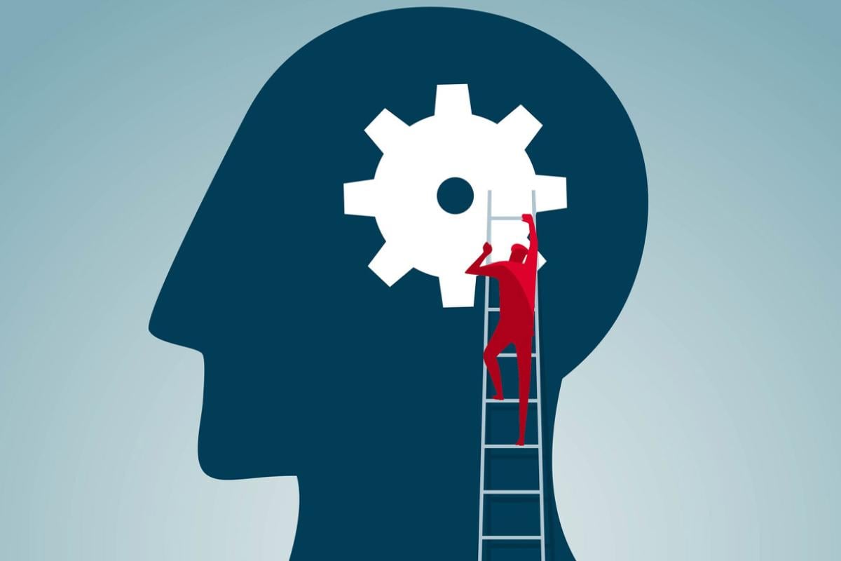 Figure climbs a ladder toward a giant gear in a human profile