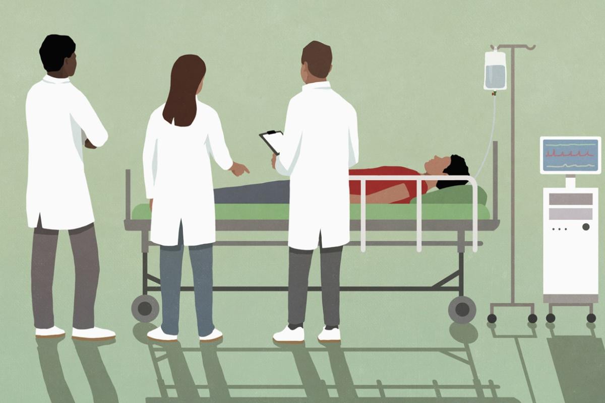 Healthcare figures surround a patient