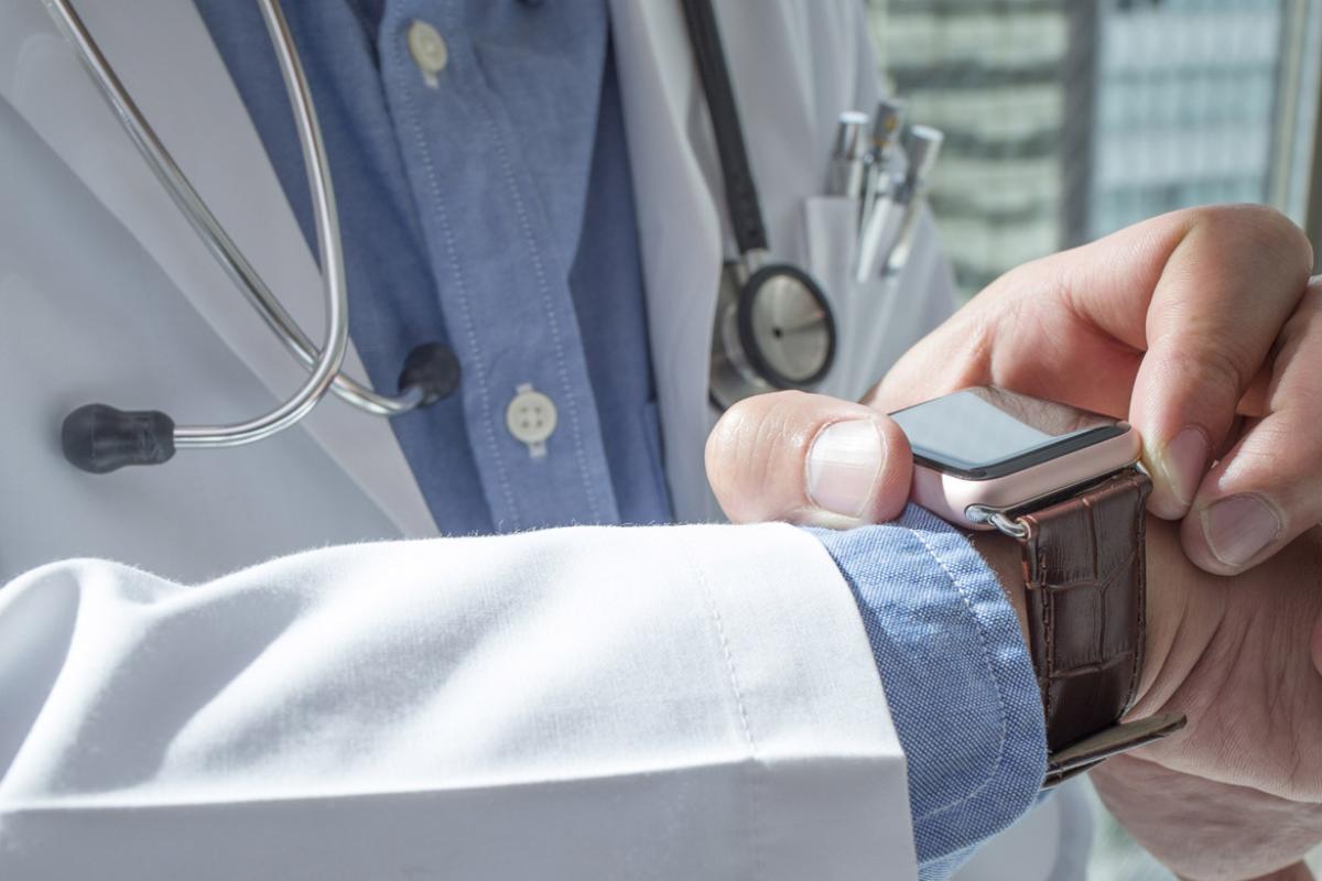 Doctor using smartwatch