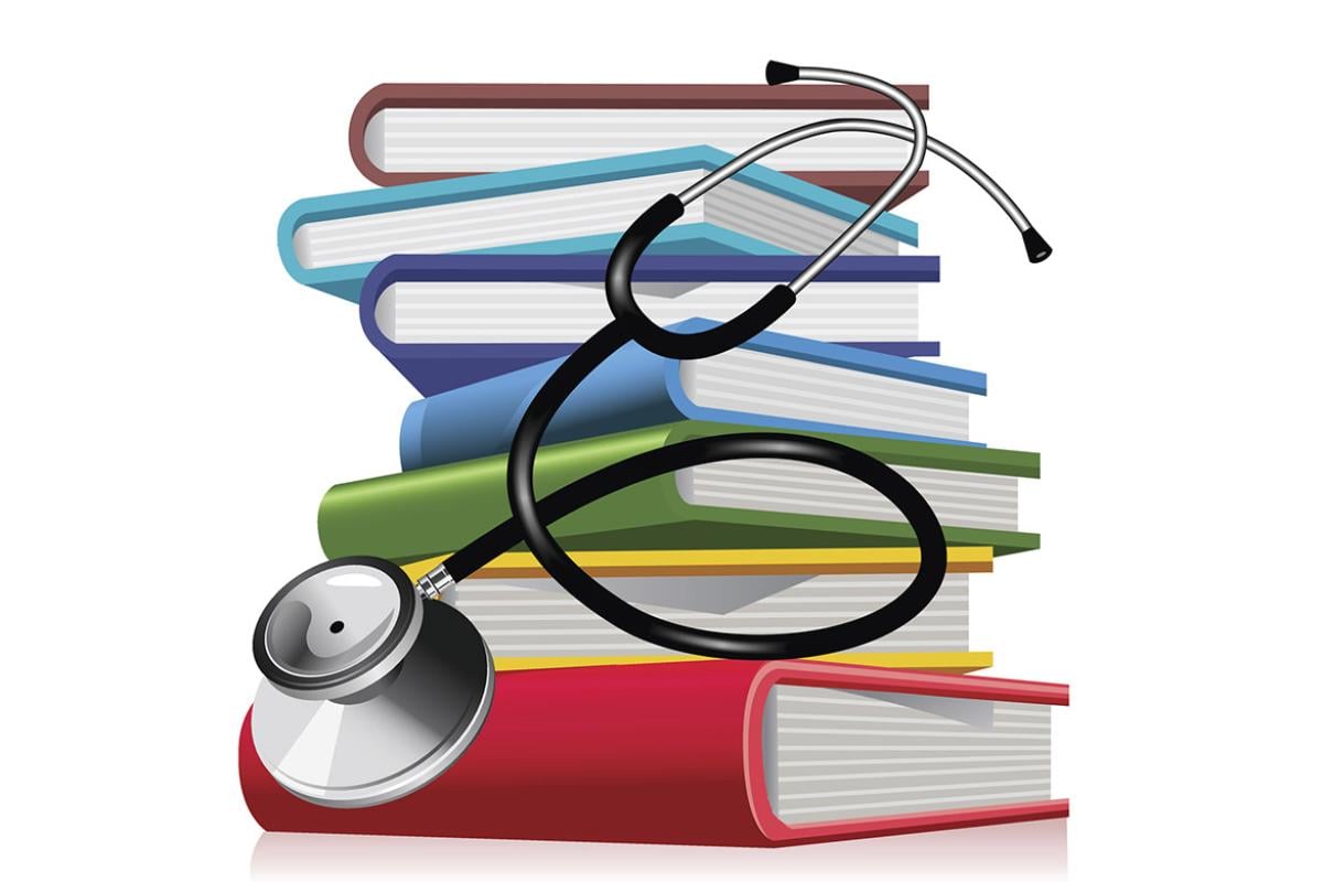 Stacked books and stethoscope