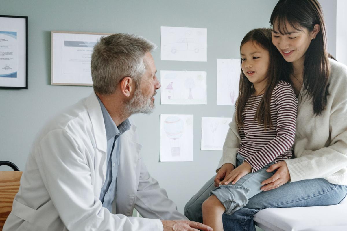 Young child and parent in a doctor's appointment
