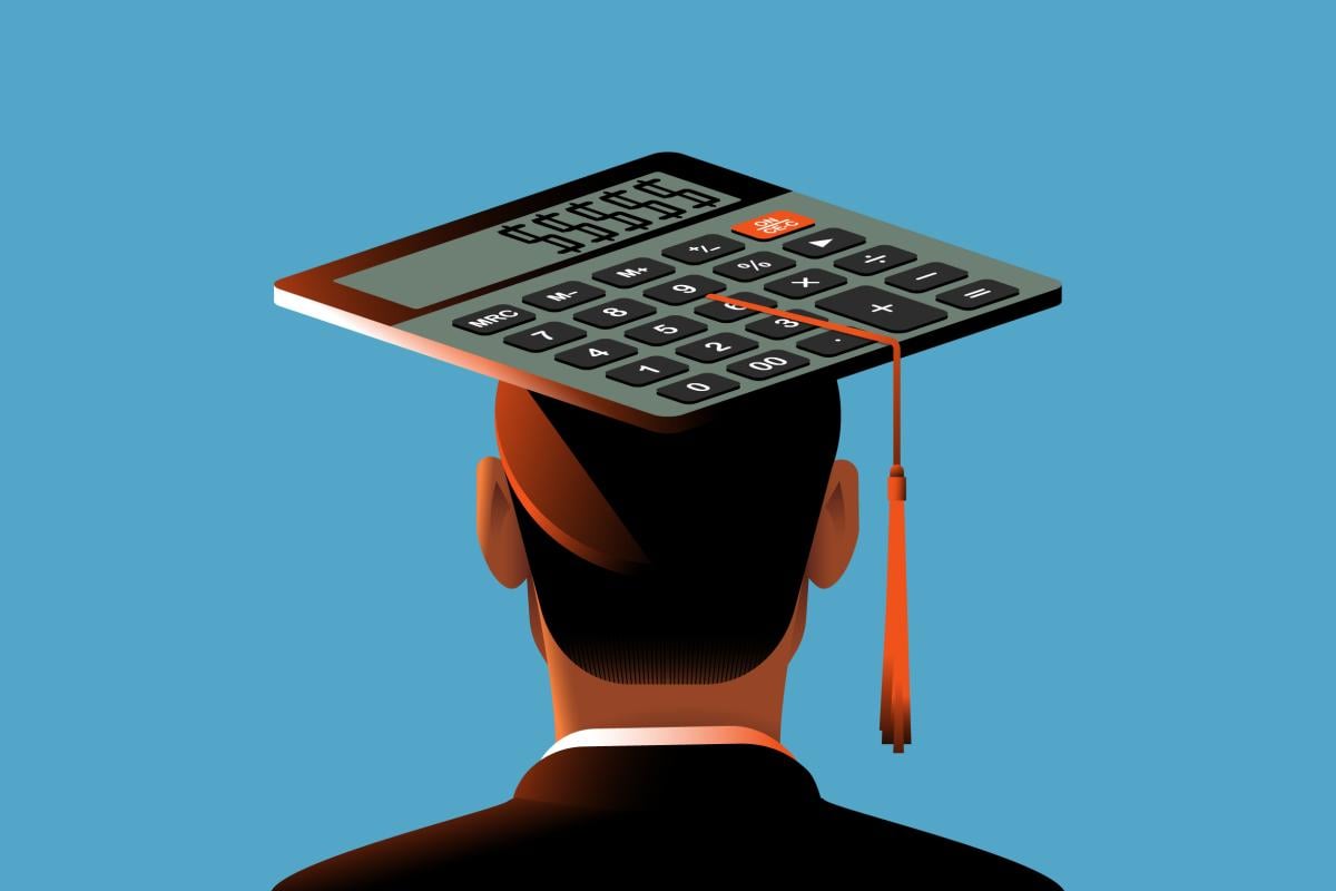  Student wearing a calculator graduation cap