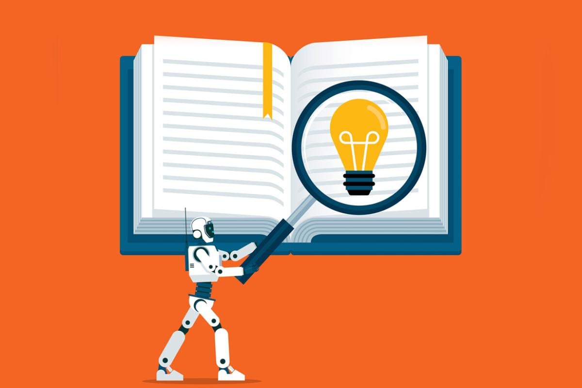 Robot with giant magnifying glass over a textbook