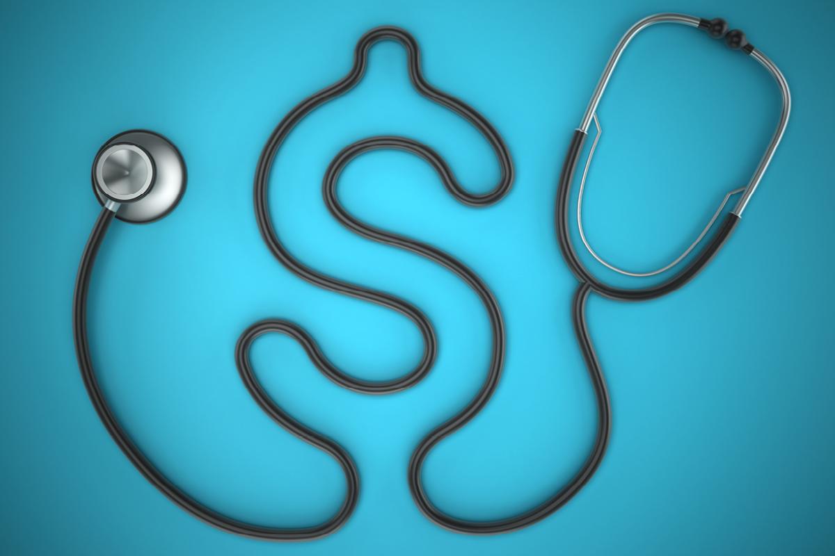 A stethoscope with the cord shaped out in the form of a dollar sign.
