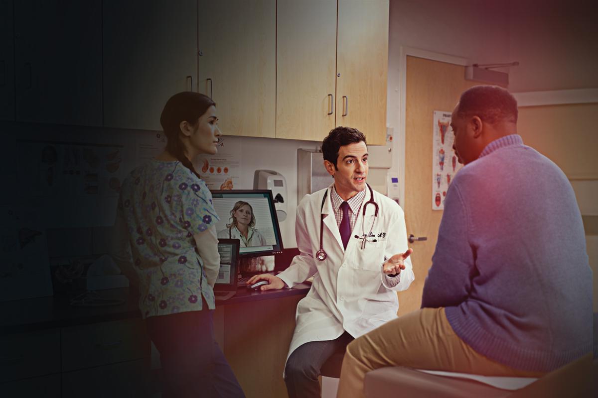 Doctor and nurse talking with patient