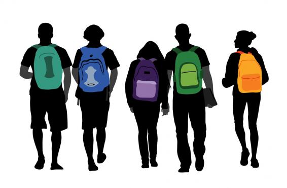 Students with colorful backpacks walking in a group