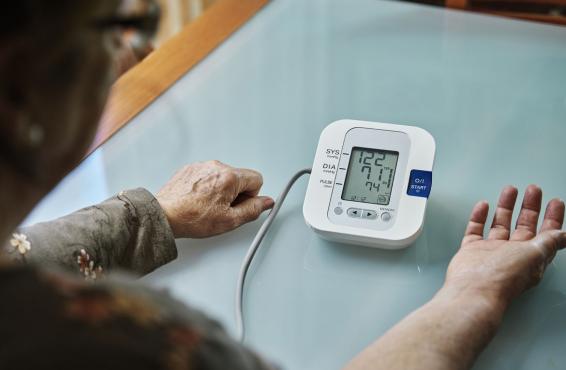 Person examining blood pressure
