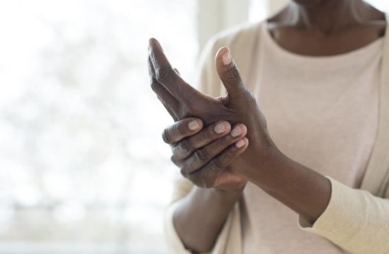 Close-up of an African-American woman's hands.