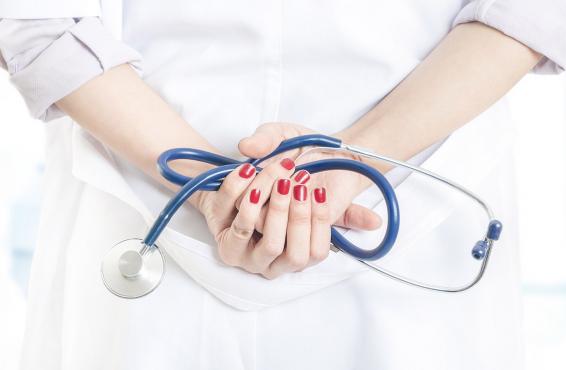 Physician holding a stethoscope