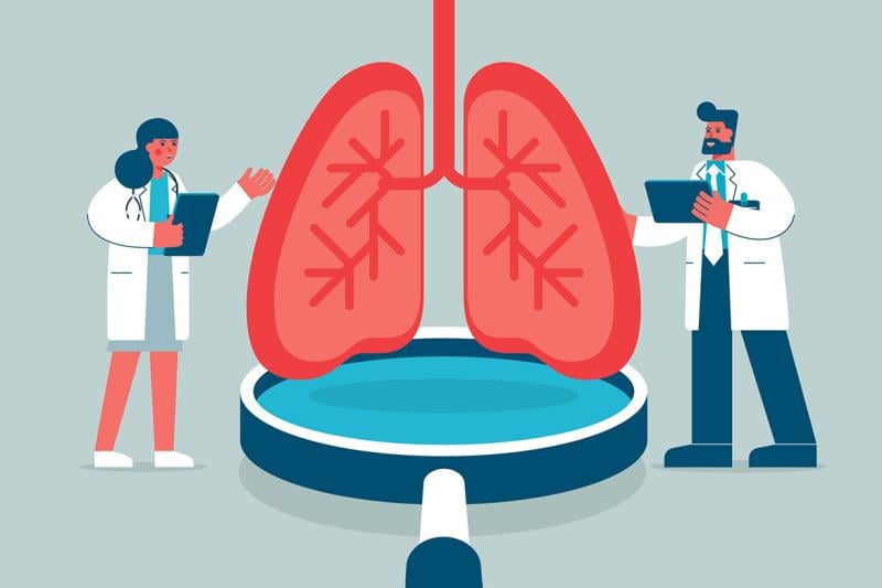 Doctors examine giant lungs over a magnifying glass