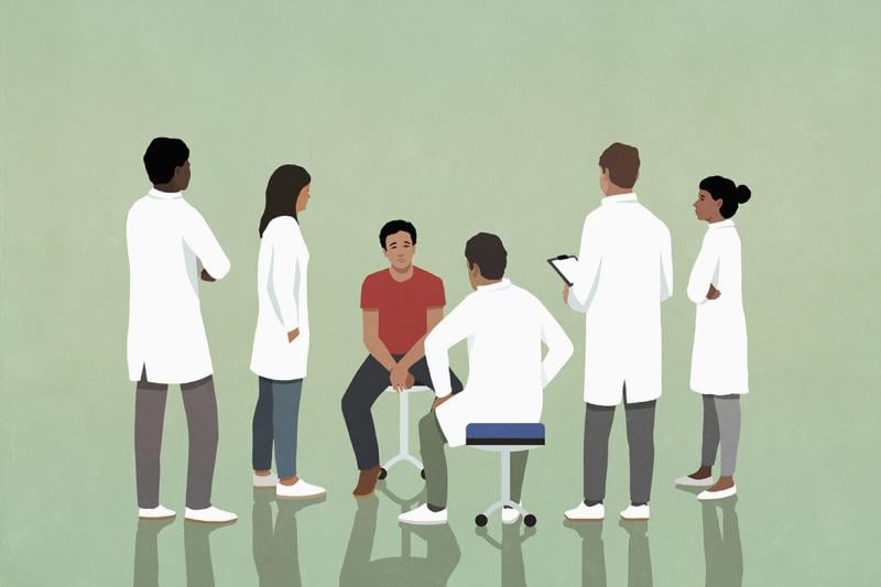 Group of residents and patient