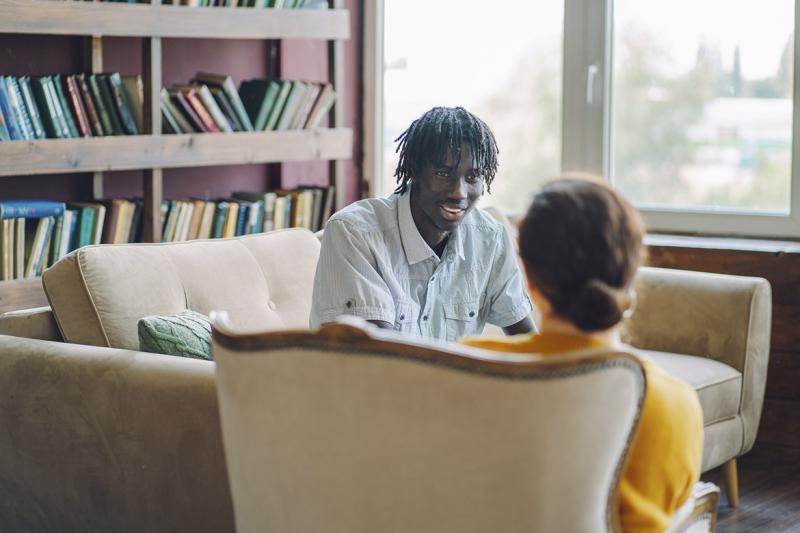 Counselor listens to a patient
