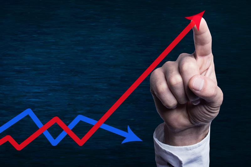 Finger traces upward trending graph